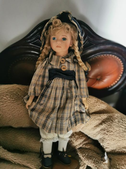 Bonecas em porcelana
