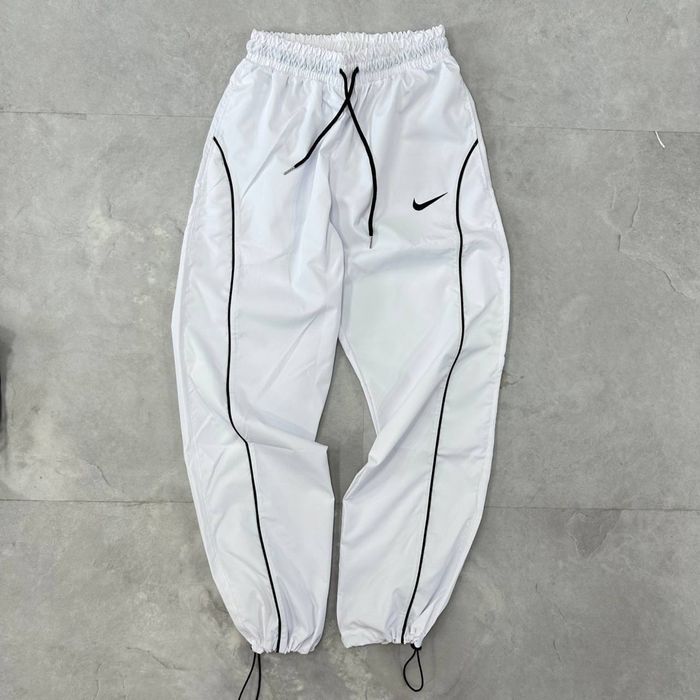 Водонепроникні штани Nike
