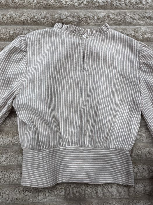 Жіноча блузка з рюшами