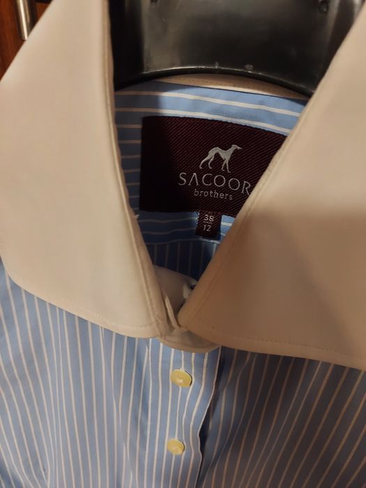 Camisa feminina da Sacoor riscas azuis e brancas