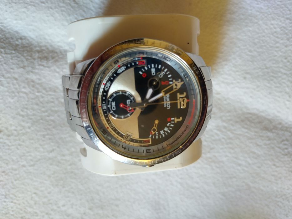 SWATCH  годинники.