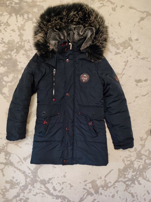 Зимова куртка на хлопчика 7-8 років