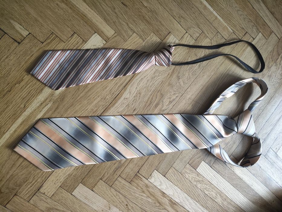 Краватки чоловічі нові.