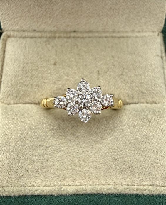 Złoty pierścionek 750 z diamentami 0,55ct Si/G-F