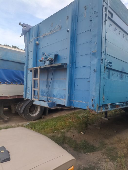 Напівпричіп бортовий тентований зерновоз