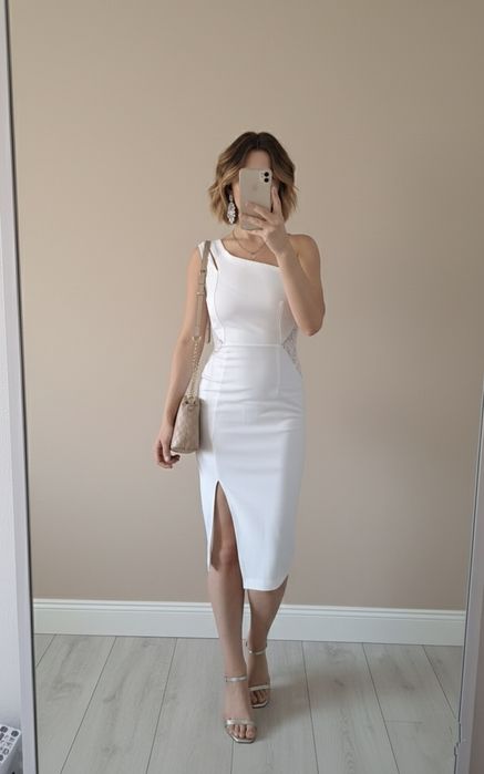 Biała sukienka midi z koronkowa wstawka 34