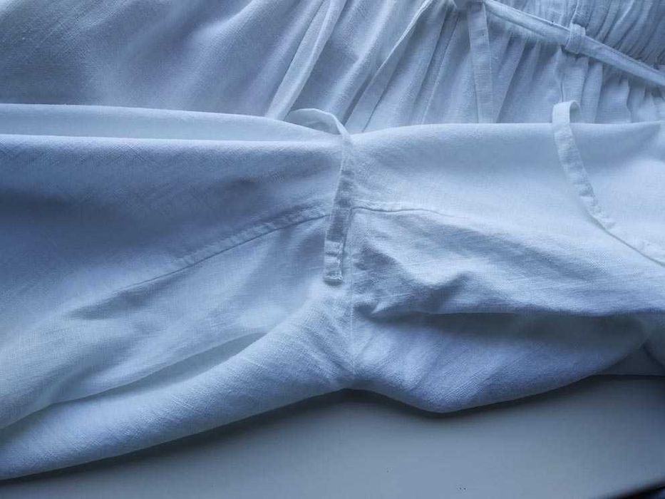 Белые льняные  брюки  фасон бананы  на бедра 120 см  лен льон лляні