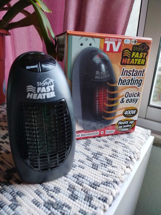 Mini aquecedor de tomada