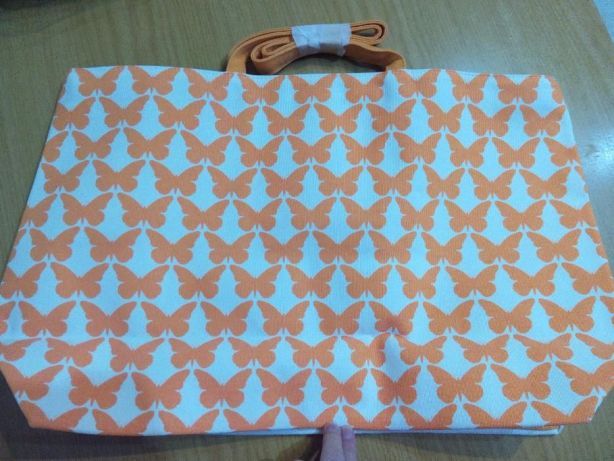 CLARINS mala com alça e dois padrões diferentes dos dois lados NOVO