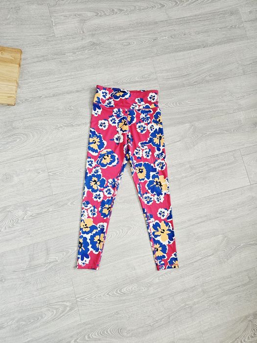 Kolorowe legginsy w kwiaty Tridri s 36