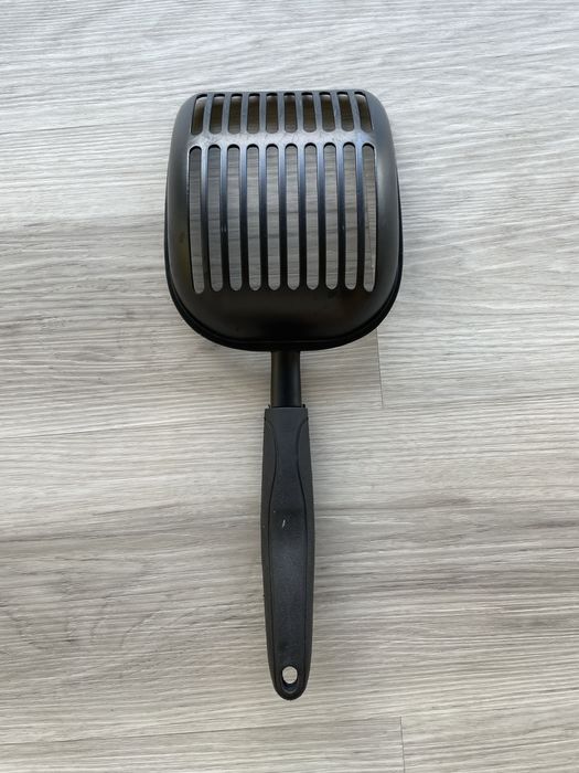 Pá para apanhar residuos de animais