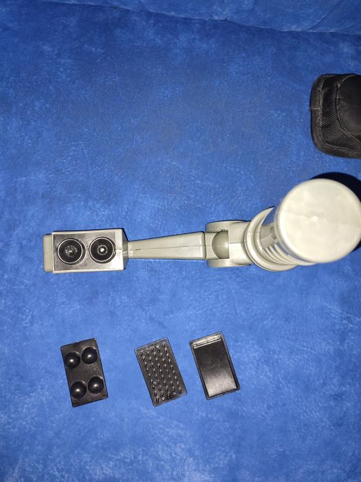 Масажер для спини