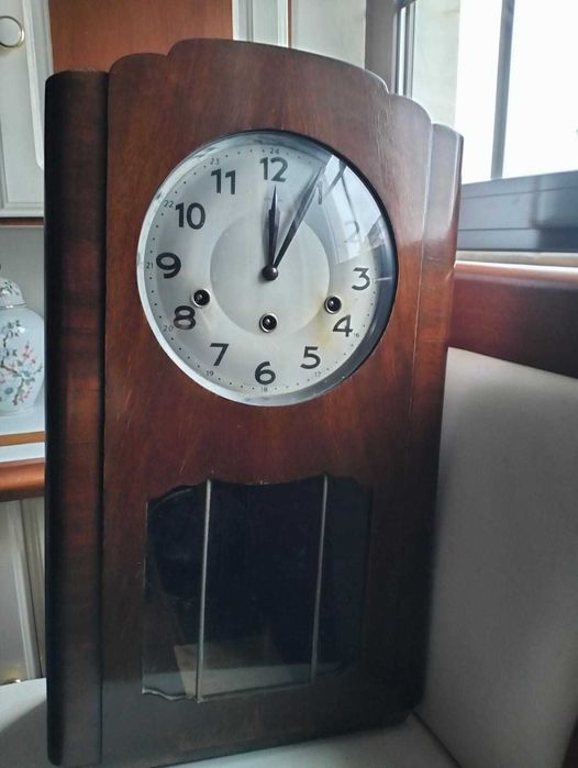 Relógio de pendulo antigo