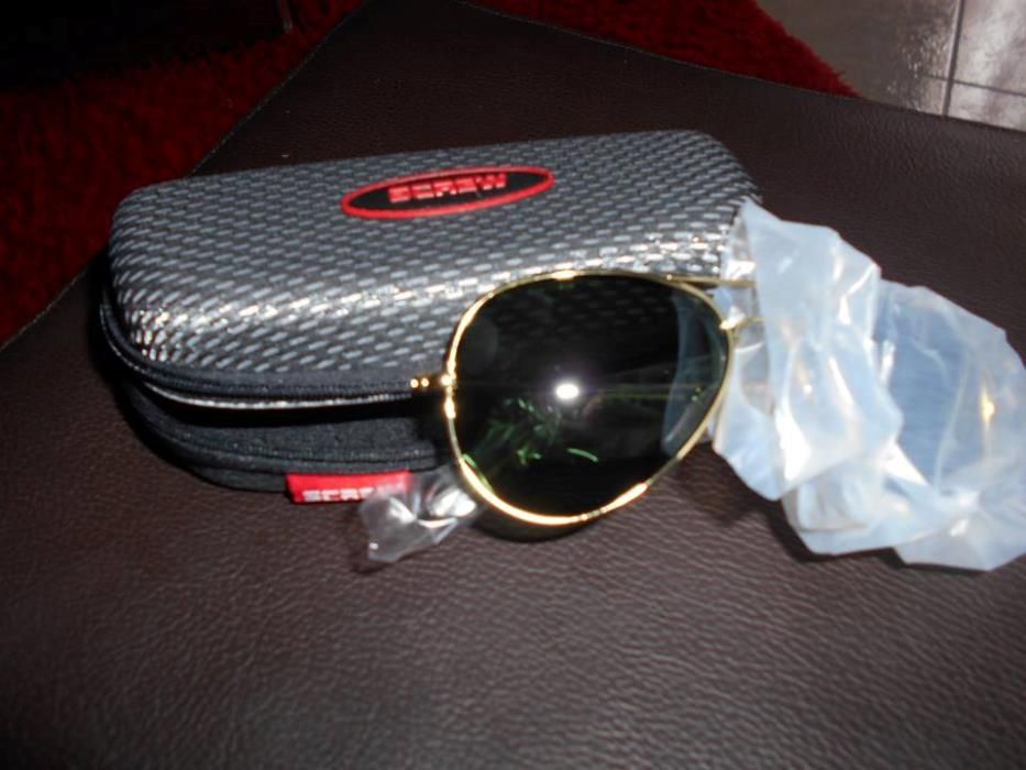 oculos sol em caixa original