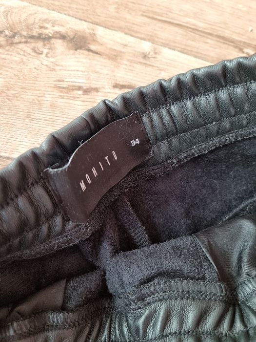 Spodnie joggery skórzane czarne Mohito xs 34