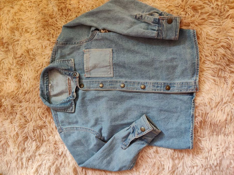 Sprzedam koszulkę na wzrost 128 cm.