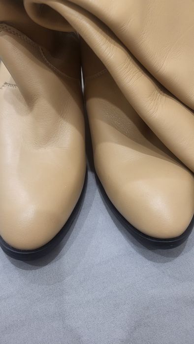 Шкіряні чоботи          .