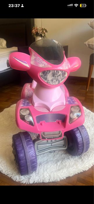 Moto  4 criança em muito bom estado