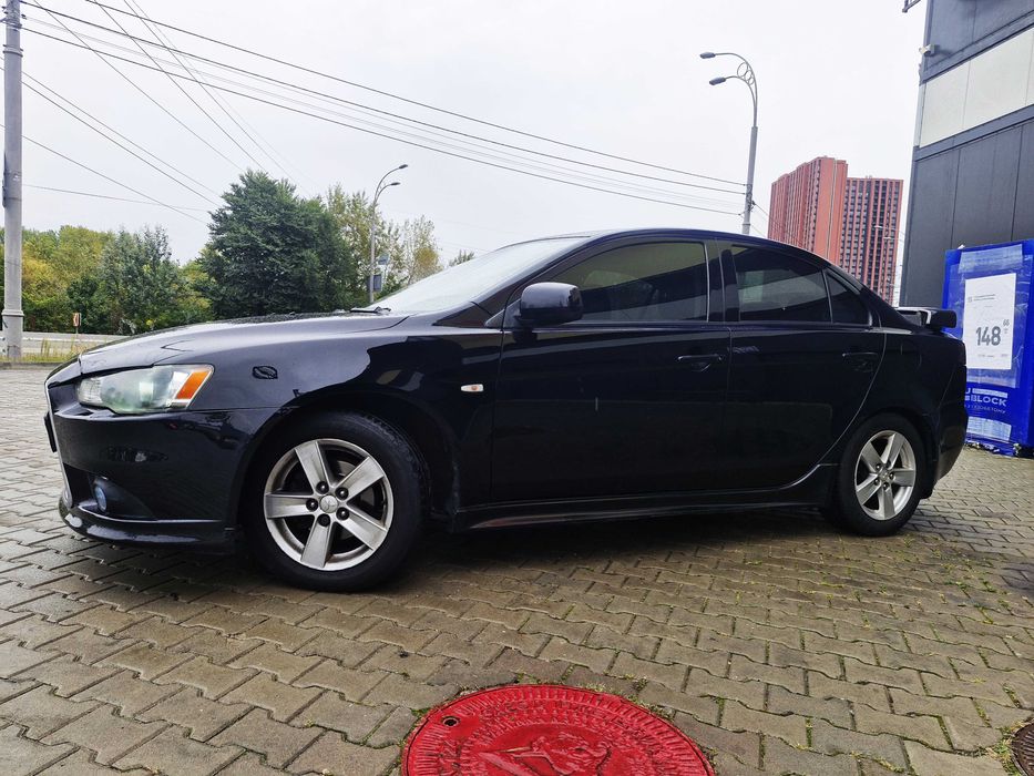 Митсубиши Лансер Х