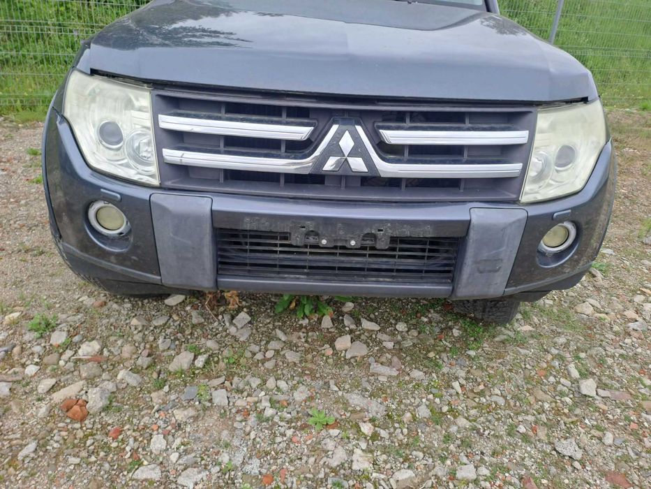 Mitsubishi Pajero  IV 2009 rok lampa drzwi maska błotnik