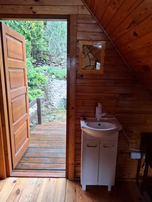 Przytulny drewniany domek + SAUNA nad jeziorem