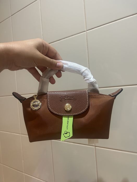 Mala longchamp castanha