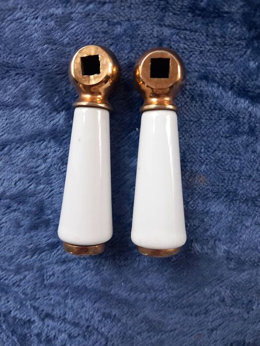 Dwa Uchwyty do baterii  spłuczki