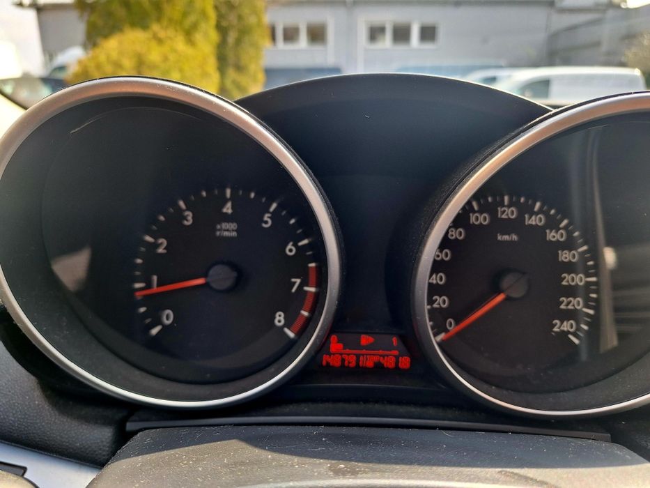 Mazda 3 Hatchback 1.6 Benzyna 105 KM  2011   148 800km