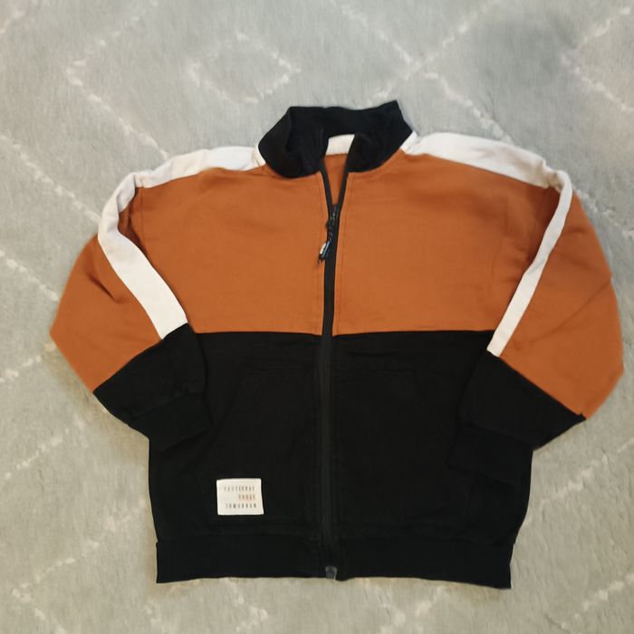 Bawełniana bluza Coccodrillo rozmiar 110