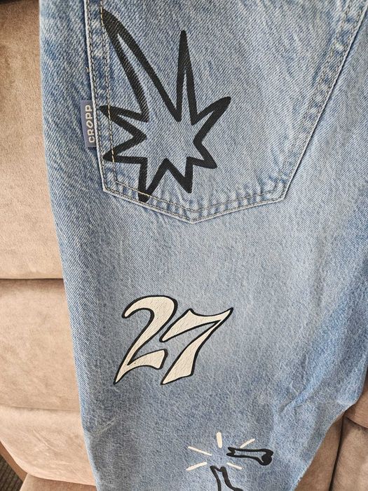 Spodnie jeansowe CROPP Super Baggy jasnoniebieskie przecierane roz 28/30