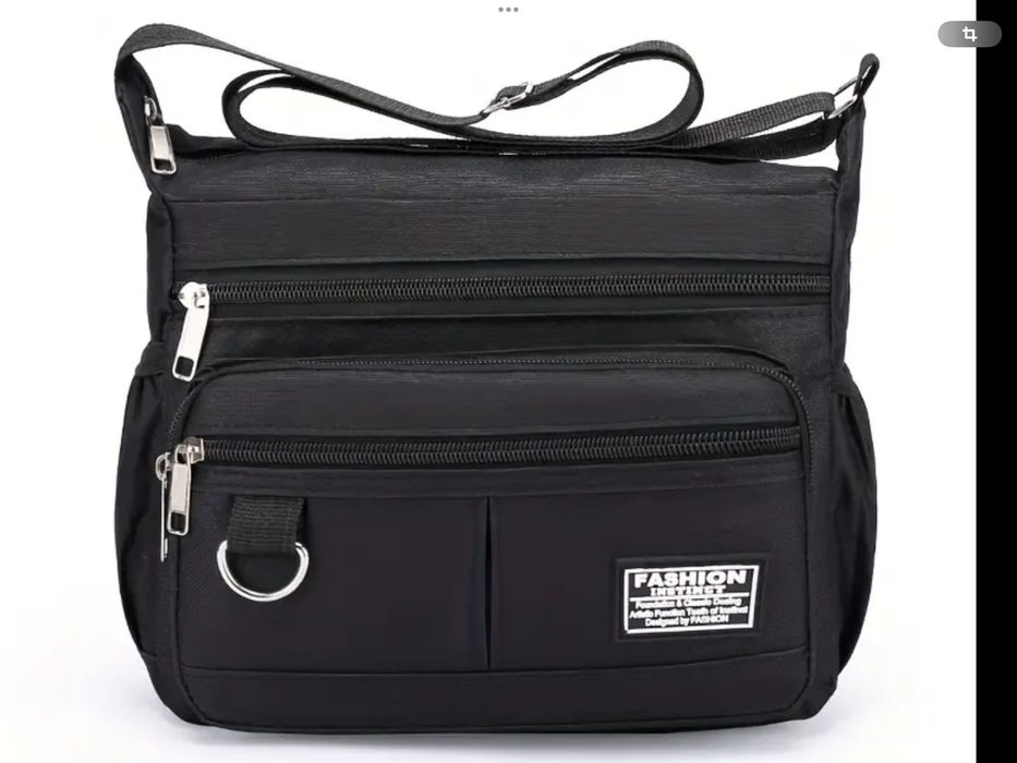 Сумка через плече з багатьма відділеннями та боковим місцем для пляшки