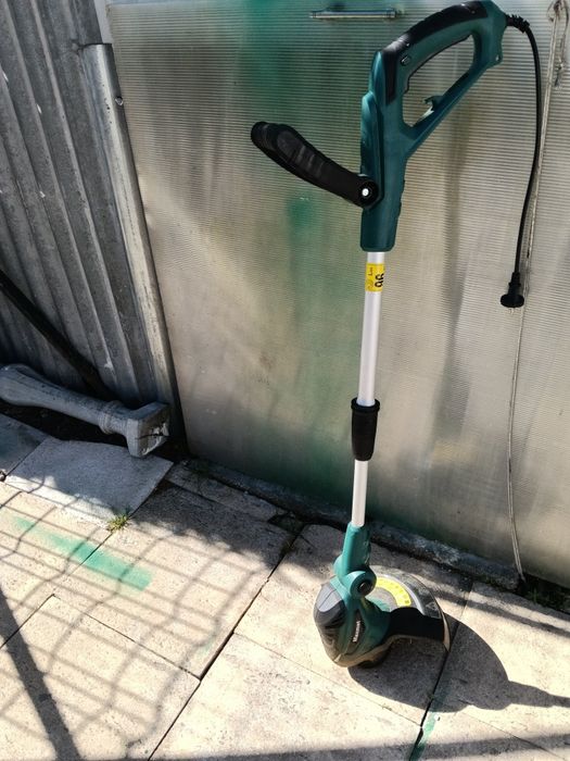 Corta beiras eléctrico