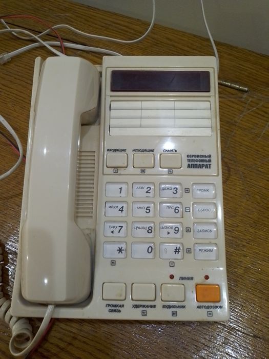 Телефон кнопочний і радіотелефон