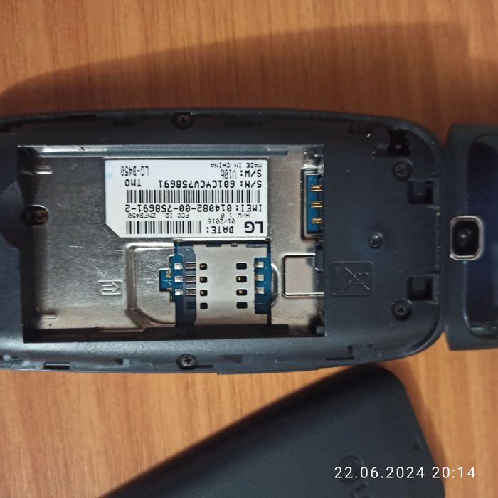 Мобільний телефон - разкладушка LG 450