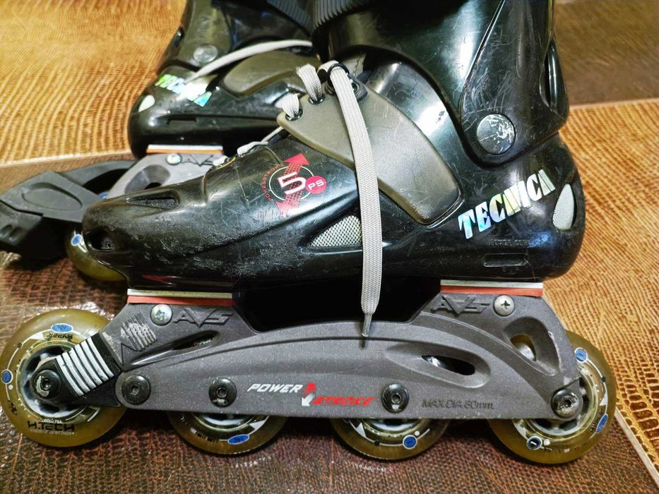 Роликовые коньки