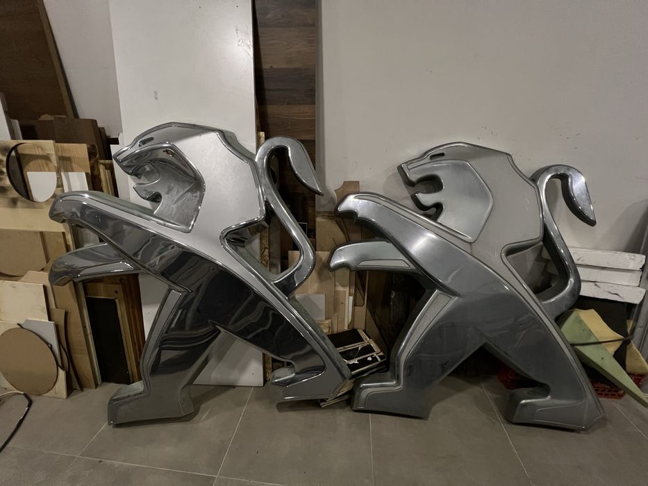 Simbolo Peugeot parede de stand