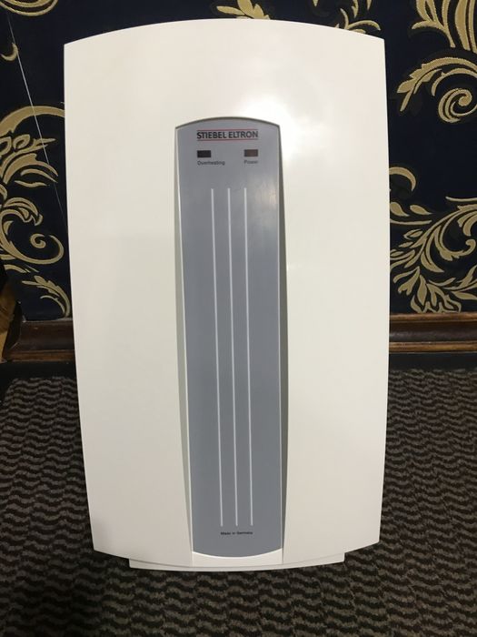 Водонагрівач  проточний. Чистий німець.