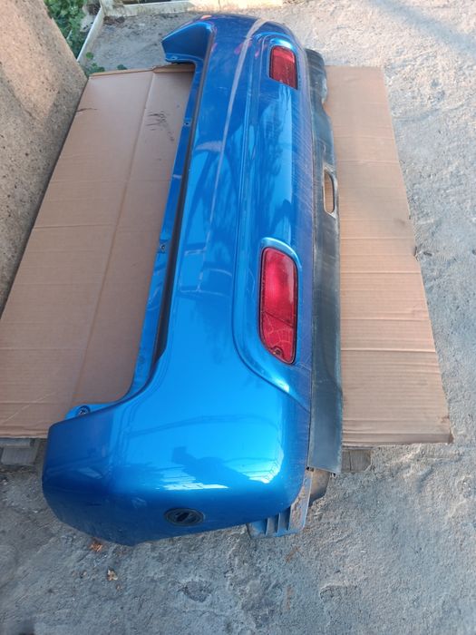 Suzuki ignis I 1 zderzak tył tylny tylni kompletny KPL