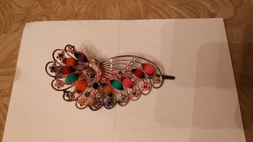 grampo de cabelo como novo