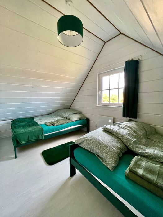 Zielony domek 12 osób Pilchy Roś basen sauna Mazury wynajem
