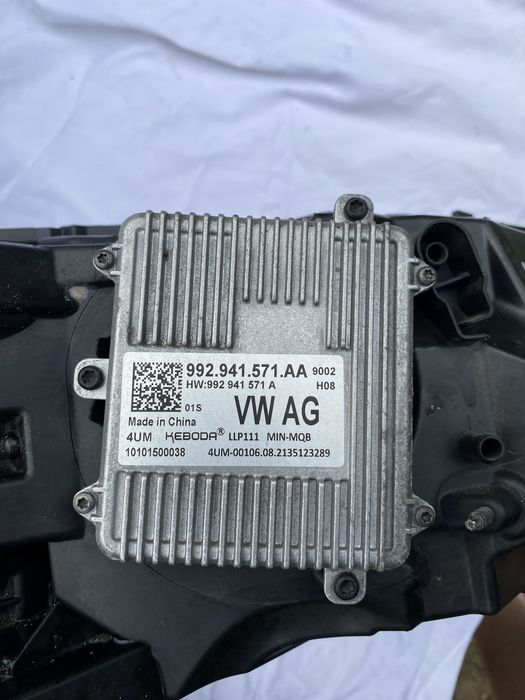 Фара Škoda Superb