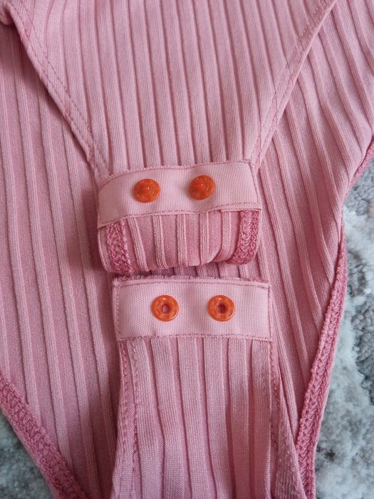 В продажі блідно-рожве боді