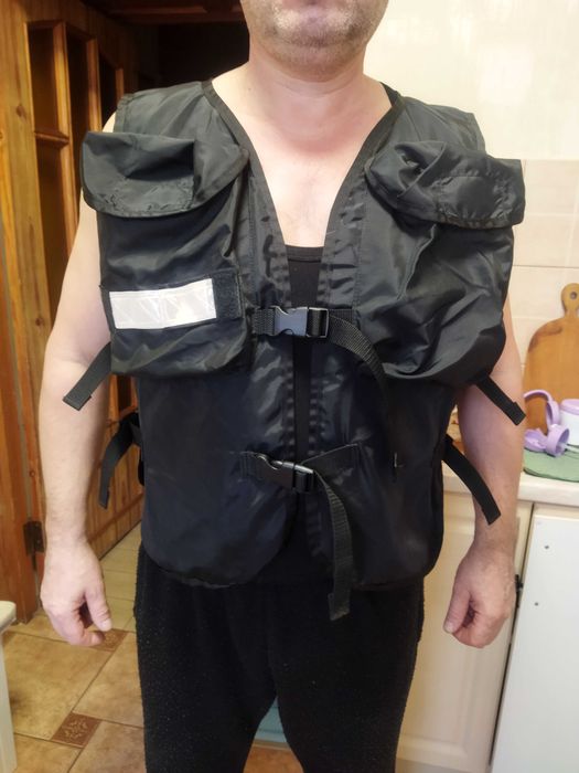 Жилет рыбака Tough Traveler Made in USA.