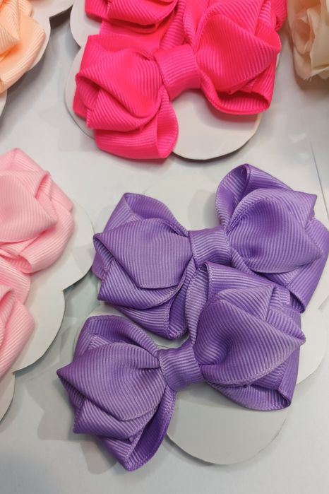 Kit Com 8 laços infantis,  com 4 cores.