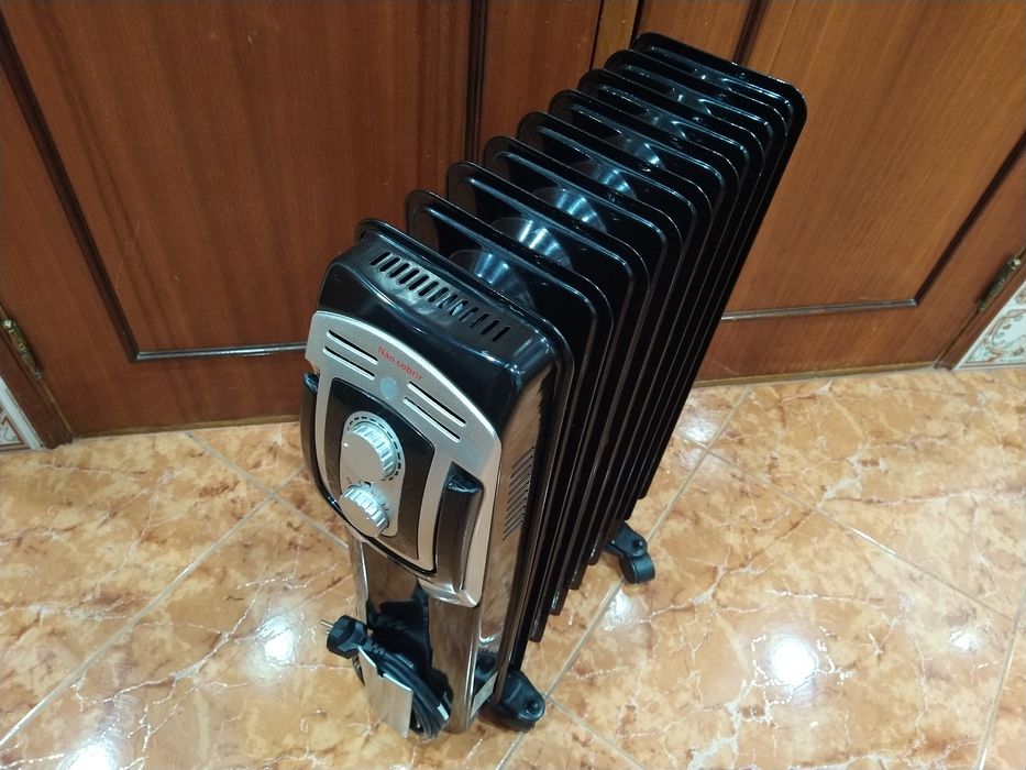 Aquecedor radiador a óleo casa quarto apartamento vivenda escritório gabinete cozinha.