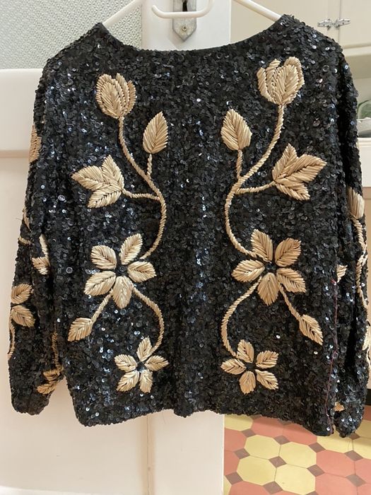 Casaco de lantejoulas 68€