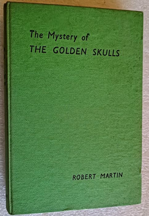 Antigo livro The Mystery of the Golden Skulls