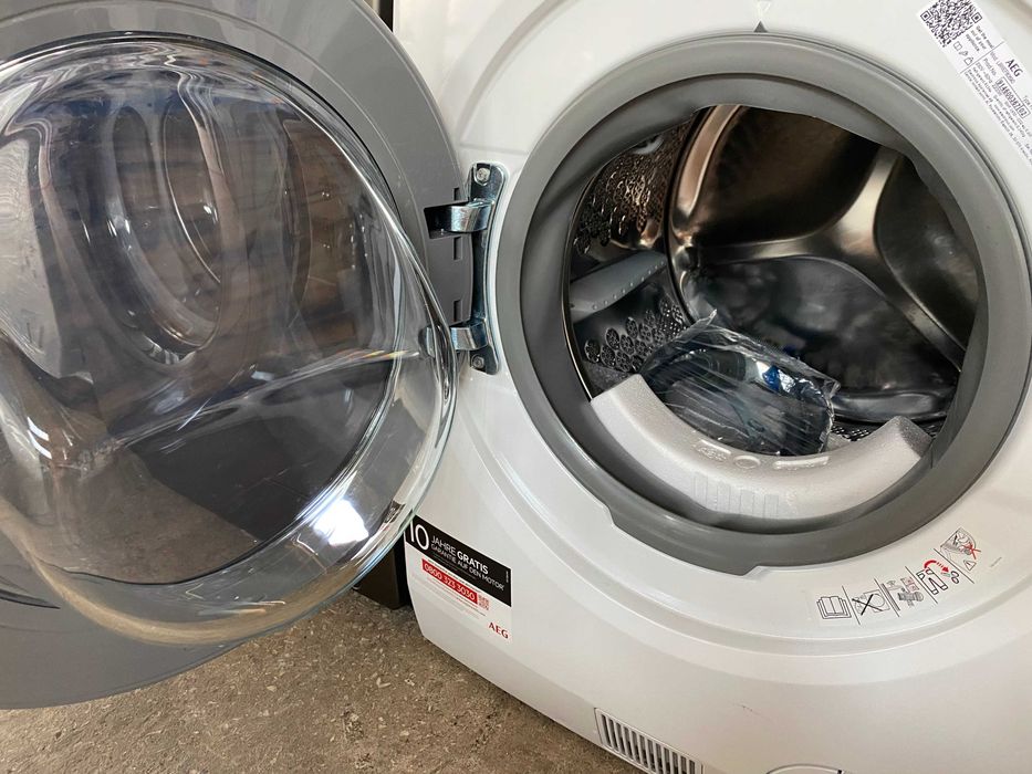 Nowa AEG  pralko-suszarka z pompą ciepła 9/6 kg Seria 9000  SensiDry