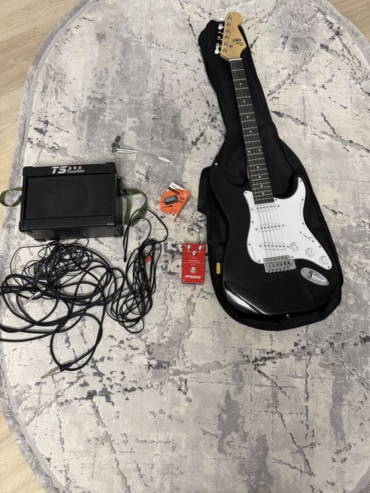 Електрогітара з комбіком і паделю