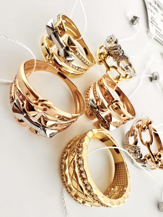 Золоті каблучки нові